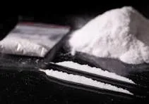 Percheziţii domiciliare în căutare de cocaină